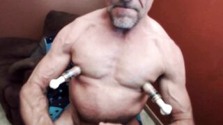 Gay Nipple Pig pumping up his giant nipples