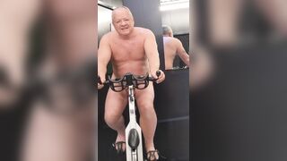 Strippng off in the gym cycle room