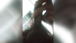 Minato plays with his long penis in the bathroom