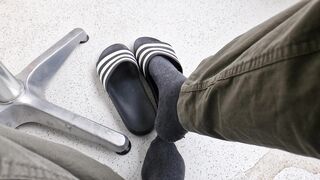 Addilettes with socks on the balcony 1