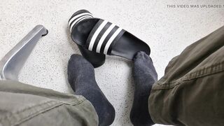 Addilettes with socks on the balcony 1