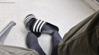 Addilettes with socks on the balcony 1