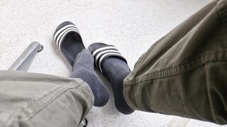 Addilettes with socks on the balcony 1