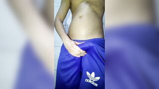 Young boy in shorts playing with his big thick shaved cock very hard horny - 7 image