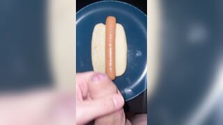 Huge watery cumshot on hotdog
