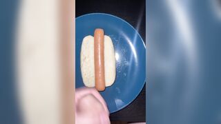 Huge watery cumshot on hotdog
