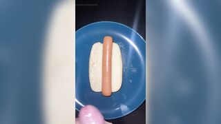 Huge watery cumshot on hotdog