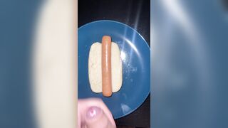 Huge watery cumshot on hotdog