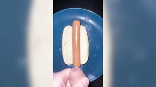 Huge watery cumshot on hotdog