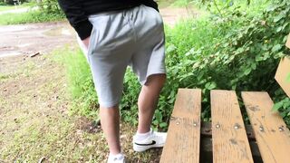 guy gets horny on the way, jerks off and cums on a bench next to the road - 2 image