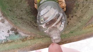 Malleable stick in the disinfectant bottle of the young straight slave.