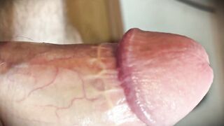 White cock is stroked to climax