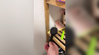 My roommate's brush and towel