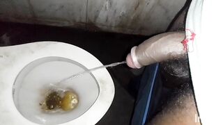 A dirty boy masturbating in memory of his wife inside the bathroom