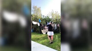 In attire with a schoolgirl dress to gather laundry and for an evening out.