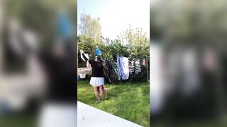 In attire with a schoolgirl dress to gather laundry and for an evening out. - 3 image