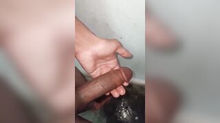 "A college boy is recording a video while giving a handjob."