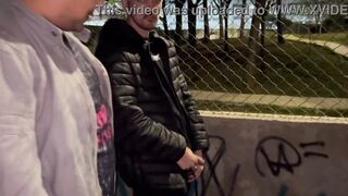 Watch as a hooded man surprises and makes his friends' night more than just ordinary with a wild threesome