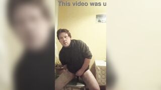 A tattooed gay man in glasses is riding a cucumber!