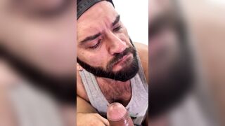 Bearded guy took a good feed and swallowed the milk