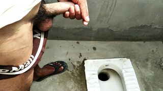 Big cock pissing in toilet room - 1 image