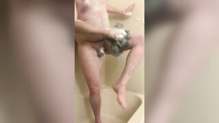 Slave showering in chastity - 2 image