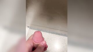 Cumming on bathroom stall