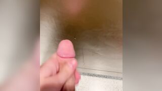 Cumming on bathroom stall
