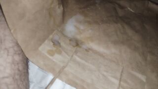 Clothes paper bag filled with a cumshot - 2 image