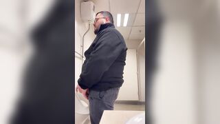 A Bull in a public toilet shooting a big load hoping to get caught. - 5 image