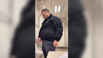 A Bull in a public toilet shooting a big load hoping to get caught.
