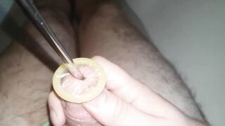 Rolling condom into urethra, urethral sounding, Close Up - 2 image