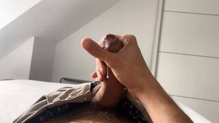 Curved uncut cock shooting a load - 1 image